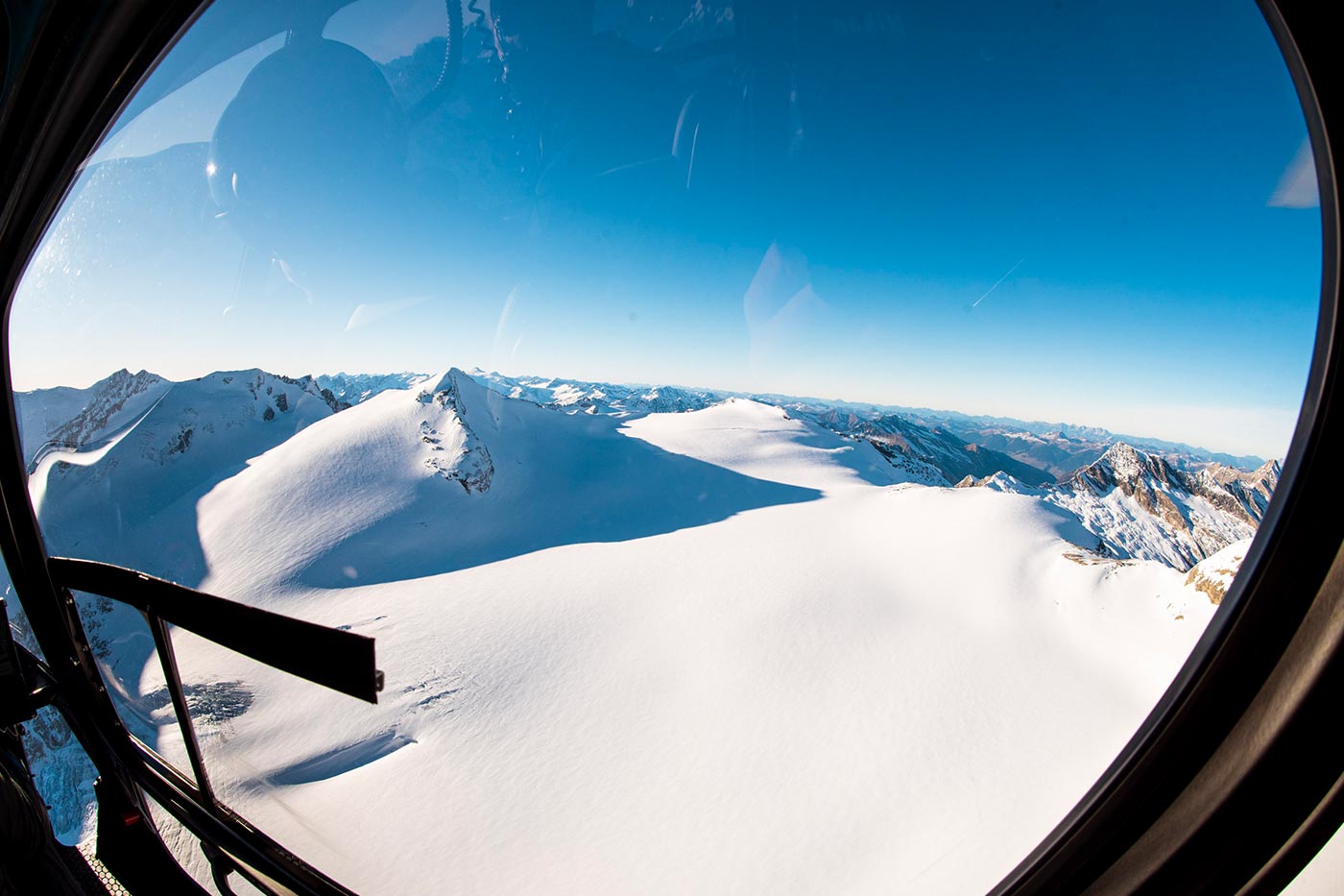 snowy alps sennair helicopter